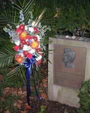 JFK Memorial wreath and stones left at a commemoration marker in front of the house where he was born