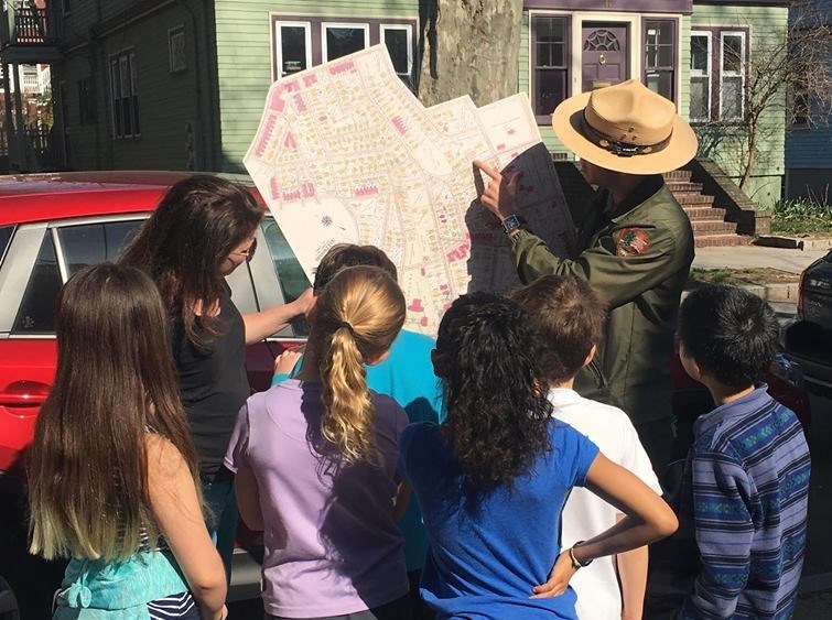 Ranger Jason identifies places that were special to the Kennedy Family on a map of Brookline. Ranger Jason identifies places that were special to the Kennedy Family on a map of Brookline.