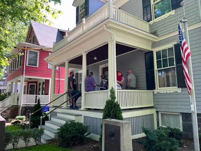 National Park Ranger giving a tour on the porch