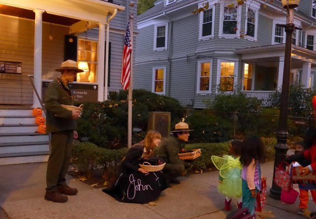 handing out candy on Halloween