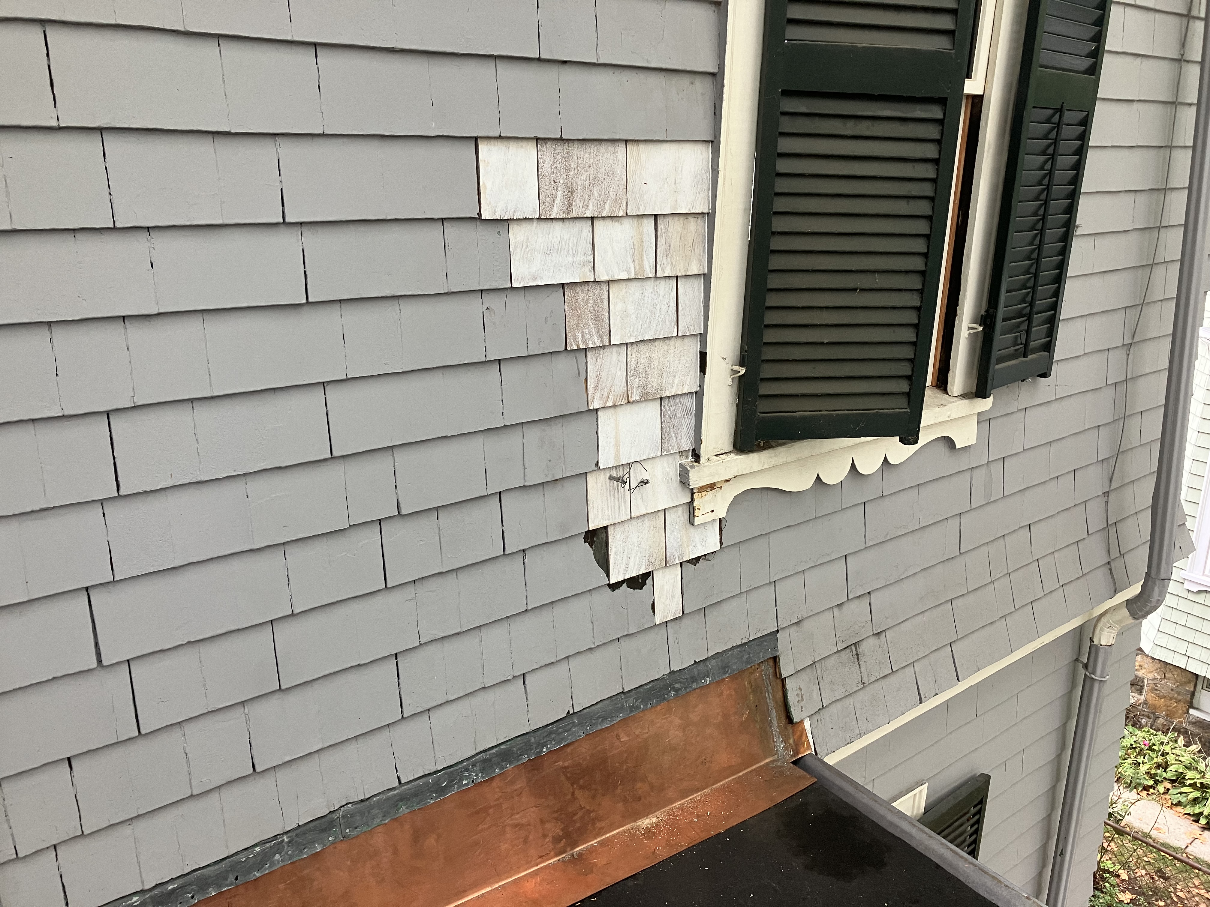 New shingles replaced on historic JFK birthplace.