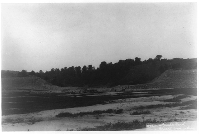 Remains of an earthen dam.