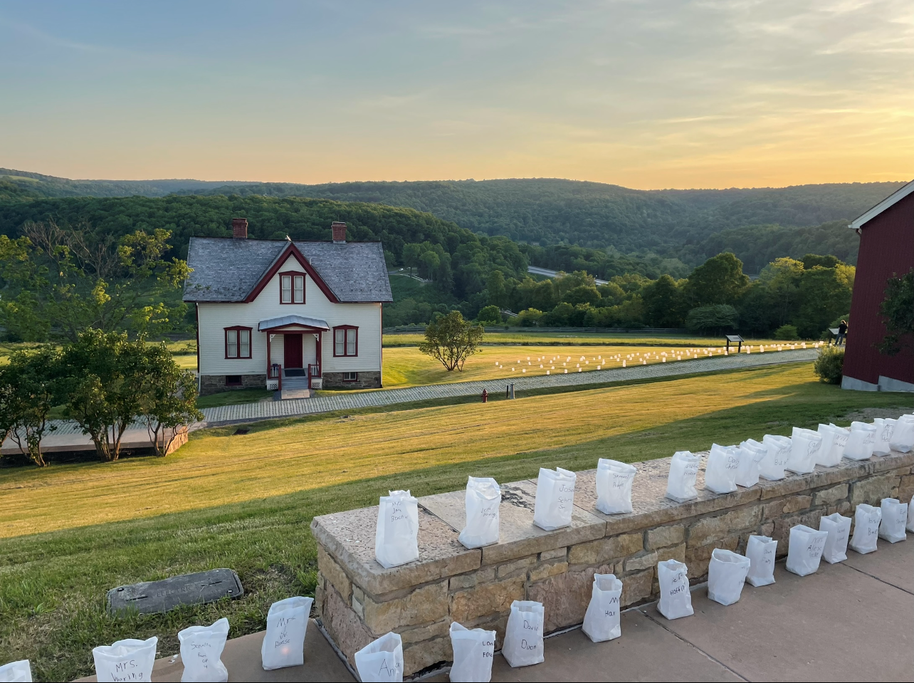 Luminaries with the Lake View House and the remains of the dam in the background.