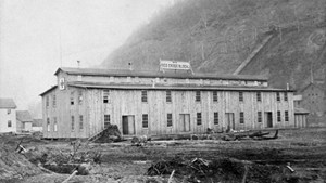 A large two-story structure made of wood