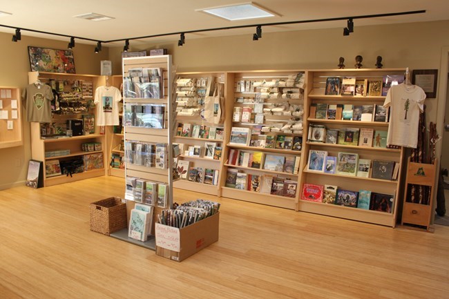 Book shelves with books and various gift items.