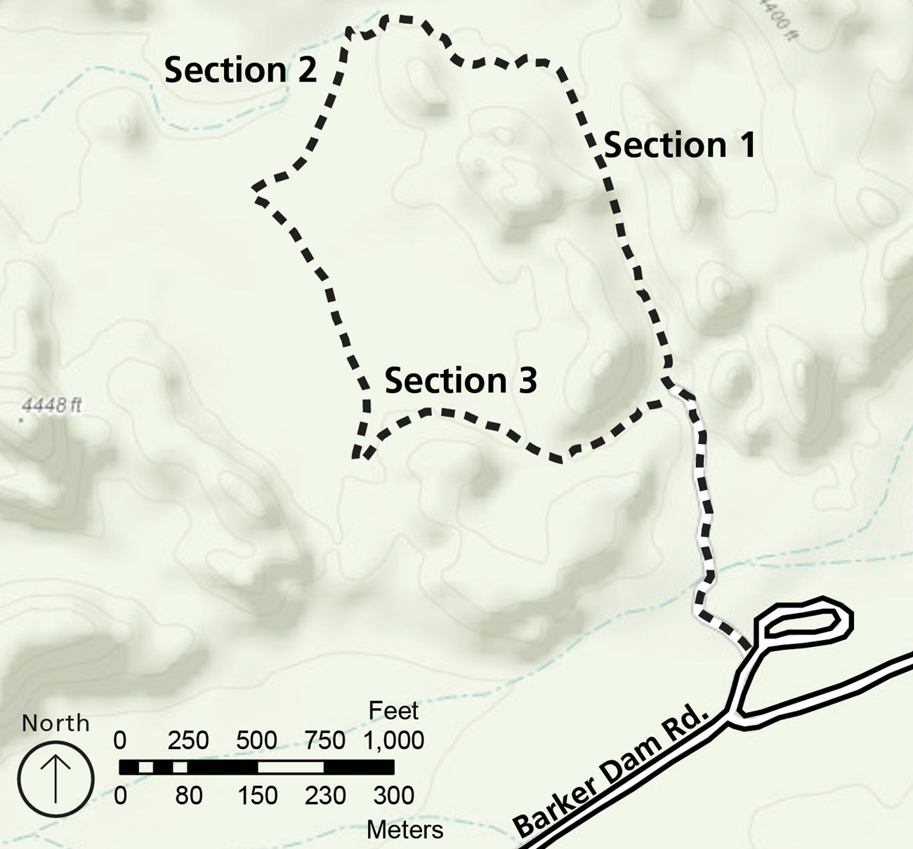 Color image of a map of the Barker Dam area. The trail leaves from a parking lot in the lower right, and makes a loop headed north, then west, south, and back east to meet partway up the first part of the trail. The trail looks like it makes a 9 in shape.