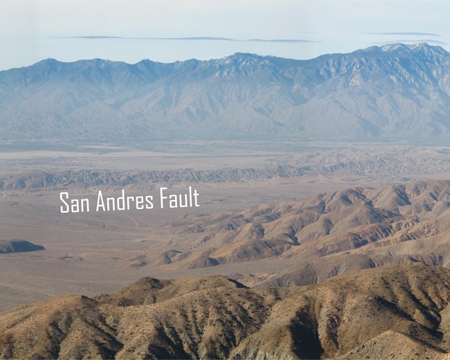 desert landscape with text that says san andres fault