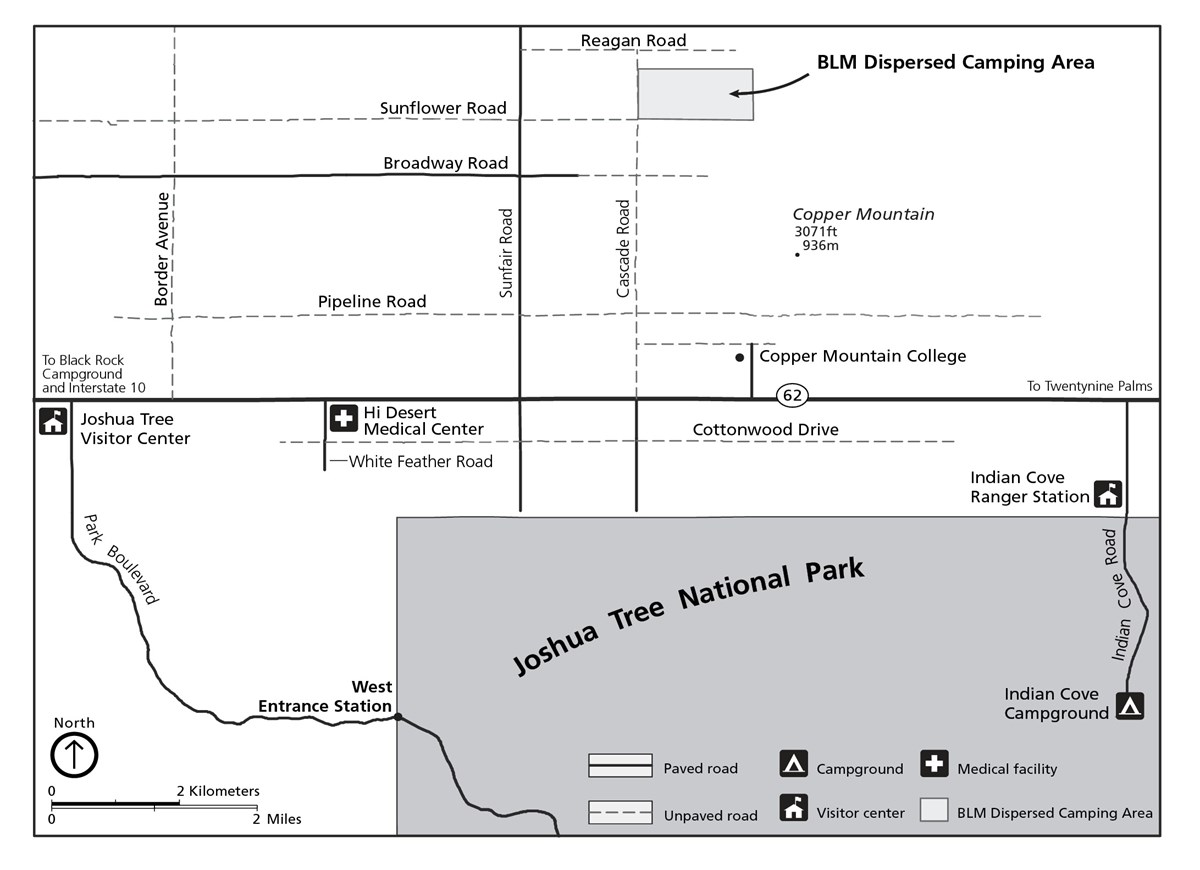A map showing the area north of Joshua Tree's boundary, in between the West Entrance and the North Entrance. A rectangle is highlighted in light blue and marked as BLM Dispersed Camping Area