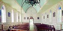 Photo of the interior of St. Philomena Catholic Chruch.