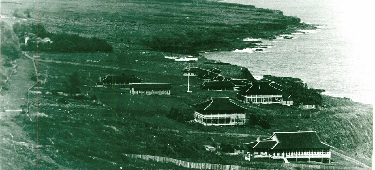 A black and white image of a couple of buildings which were the U.S. Leprosy Investigation Station Facility in Kalawao