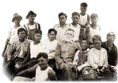 A group of men and boys, the one in the middle is Brother Joseph Dutton.