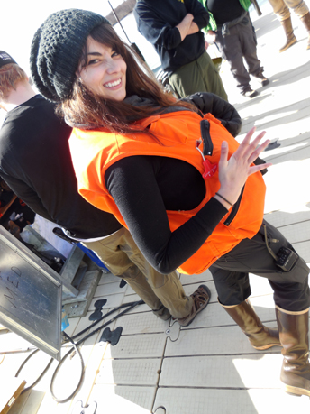 Person standing with emergency survival vest