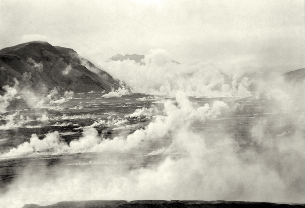  A landscape with columns of steam rising from the ground