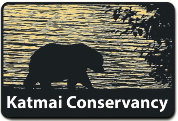 Katmai Conservancy Logo Silhouette of a bear near a lake