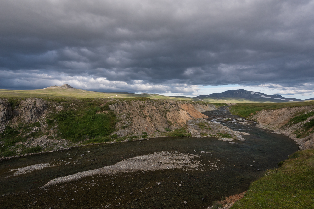 Funnel Creek in the Katmai Preserve A stream with distant mountains in evening light