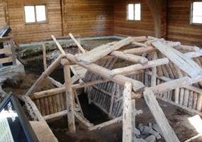 A reconstructed 650-year old house at the Cultural Site Exhibit.