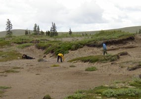 Archeologists documenting a Paleoarctic tradition site in Katmai National Park.
