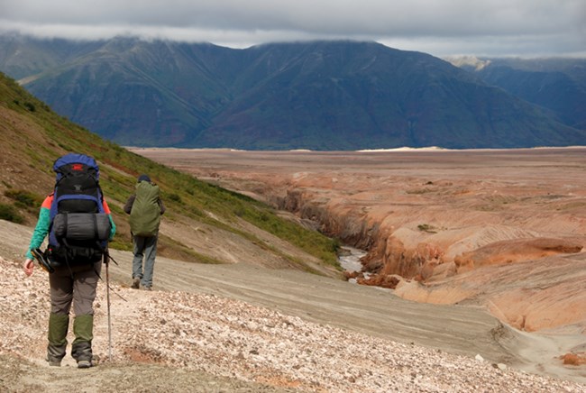 Hikers along the Buttress Range in the Valley of Ten Thousand Smokes