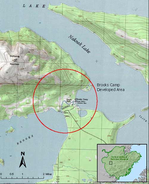 topographic map of an area showing two large lakes and a narrow river between them labelled brooks camp developed area. inset map illustrates that this is located in the western part of katmai national park and preserve