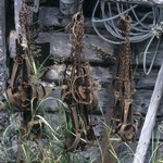 Traps hanging on the outside of a cabin