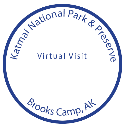 blue text in a blue circle saying, "Katmai National Park & Preserve, Virtual Visit, Brooks Camp, AK"