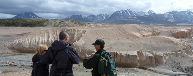 A ranger leads visitors on the Valley of Ten Thousand Smokes Tour A ranger leads visitors on the Valley of Ten Thousand Smokes Tour