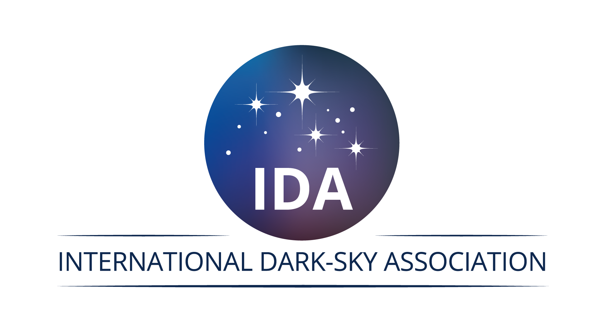 The logo for the International Dark-Sky Association consists of a dark blue circle with scattered white stars. At the bottom, the letters IDA are in white capitals.