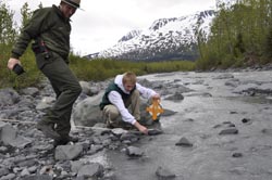 Matthew conducting streambank measurements