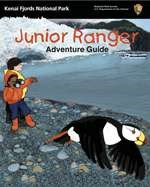 Kenai Fjords National Park Junior Ranger Adventure Guide with illustrated cover of kids looking at a puffin.