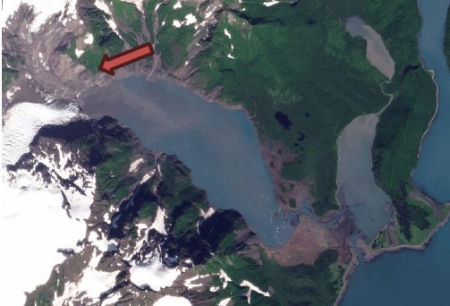 Satellite image of Pedersen Lagoon with a red arrow pointing to landslide origin. Satellite image of Pedersen Lagoon with a red arrow pointing to landslide origin.