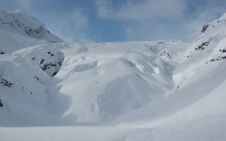 Looking up the valley at a snow-covered Exit Glacier.