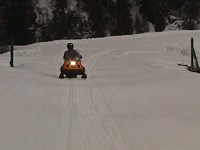 Snowmachine on Exit Glacier Road.