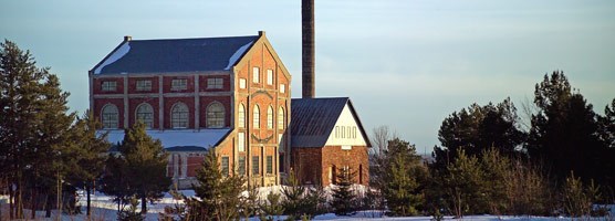 The Nordberg Hoist House at the former Quincy Copper Mining Company catches the last rays of the winter sun. NPS Photo. Dan Johnson