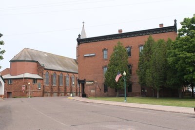 The exterior of building with a sign that says "Calumet Visitor Center."