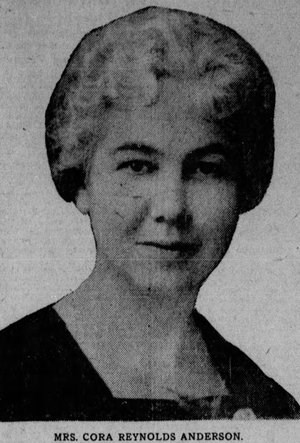 A woman poses for a photograph from the neck up.