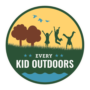 A logo depicting thee children playing outside with the words "Every Kid Outdoors".