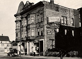 Photo of the Maggie Walz Block on 6th Street in Calumet, circa 1942.