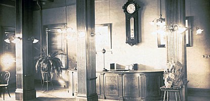 Historic photo: the reception desk at the C&H Public Library. Historic photo: the reception desk at the C&H Public Library.