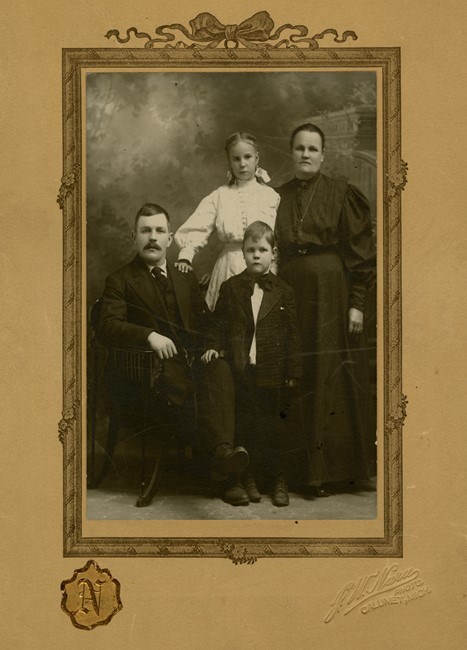First- and second- generation Finnish immigrants Jacob, Margaret, Armas, and Amanda (Warren) Blander are pictured around 1908 in this historic family portrait photograph from the Margaret Blander and Helmi Warren family papers.