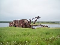 The remnants of the Quincy dredge sit in Torch Lake.