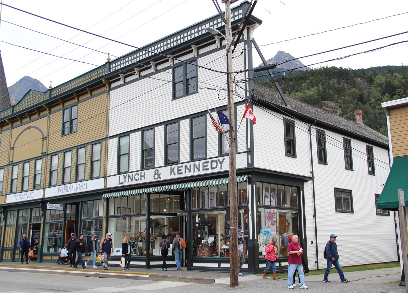 False front white building with sign "Lynch & Kennedy"