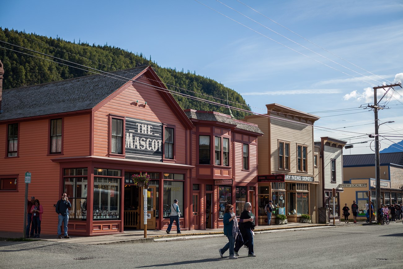 brightly colored buildings line a street