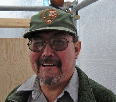 A man in an NPS uniform. A man in an NPS uniform.