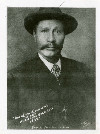 portrait alaskan native man with hat black and white