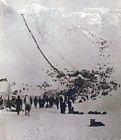 Historic photo of people at the scales and climbing the pass