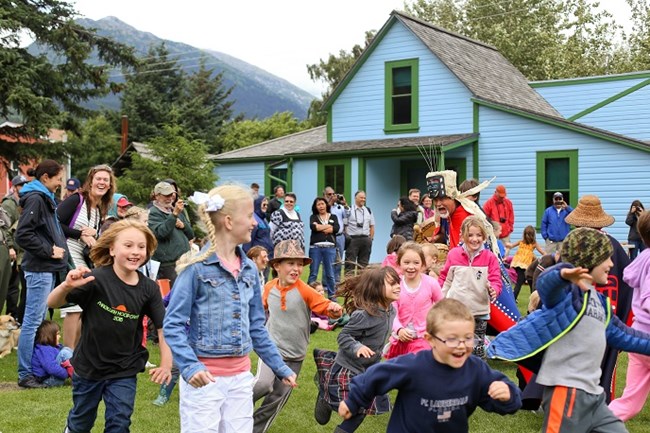 Children participating in a game in a lawn