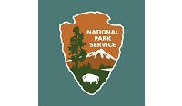 National Park Service arrowhead on blue background