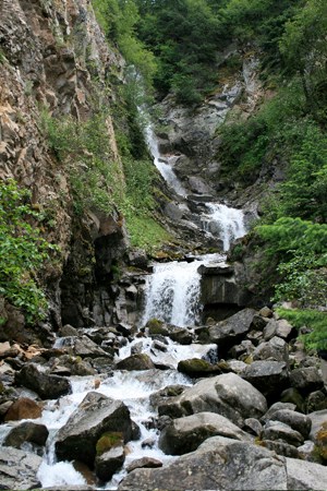 A waterfall in a rocky area