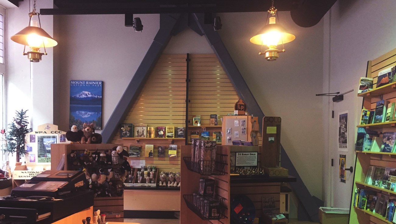Inside store with various merchandise displayed.