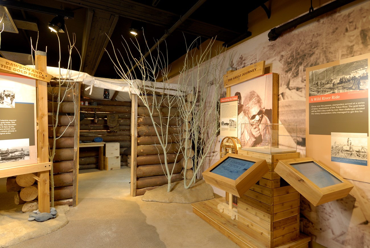 view of log cabin exhibit within a museum space